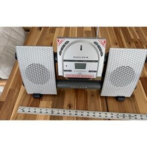 Delphi SA10034 CD Audio System MP3 AM FM Radio XM Satellite Radio Dock Silver